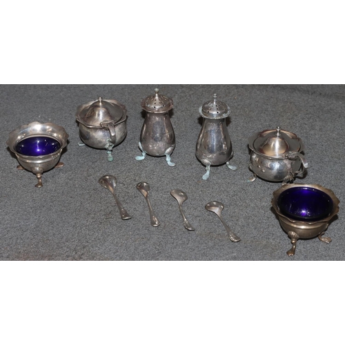 246 - A Harlequin set of 6 silver condiment set, comprising of a pair of round scallop shaped lidded musta... 