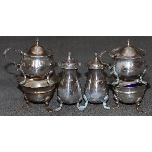 246 - A Harlequin set of 6 silver condiment set, comprising of a pair of round scallop shaped lidded musta... 