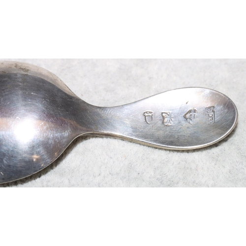 247 - A Continental silver coloured metal caddy spoon, 0.6oz