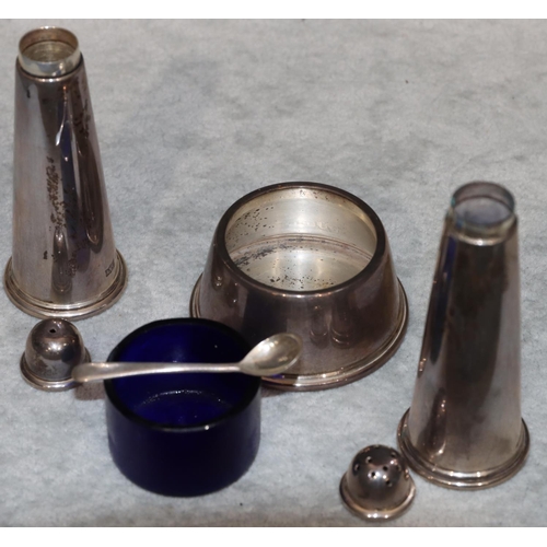 259 - A Birmingham silver 3-piece condiment set comprising of salt, pepper pot and mustard with blue glass... 