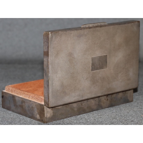 265 - A Birmingham silver rectangular shaped cigarette box with engine turned hinged lid enclosing cedar l... 