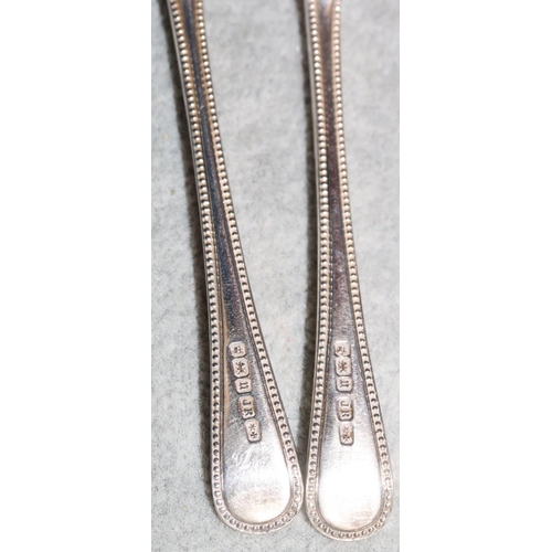 269 - A set of 6 Sheffield silver teaspoons with raised ball rims, in fitted black leather case, 3oz