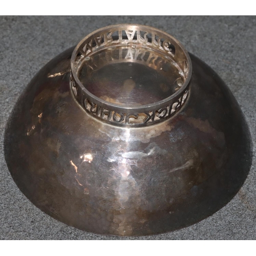 273 - A hammered silver round bowl on pierced base, inscribed 