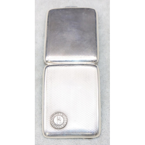 290 - A Birmingham silver matchbox case with engine turned decoration, hinged front, 1oz