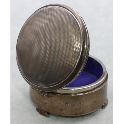 307 - A Birmingham silver round trinket box with engine turned hinged lid enclosing blue velvet interior o... 