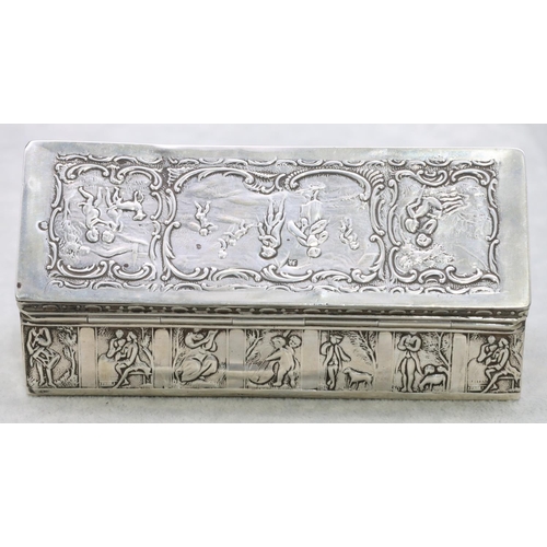 310 - A Continental silver imported rectangular shaped box with hinged lid and allover embossed figure, cu... 