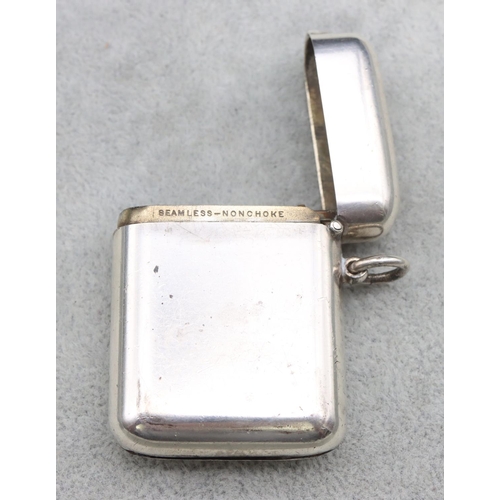 312 - A Chester silver plain vesta case engraved 