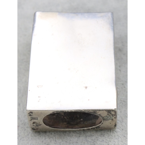 320 - A Chinese silver coloured metal matchbox holder with engraved dragon decoration, 5cm wide, 0.65oz