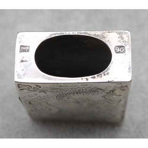 320 - A Chinese silver coloured metal matchbox holder with engraved dragon decoration, 5cm wide, 0.65oz