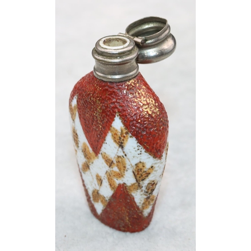 325 - A china and silver topped scent bottle with hinged lid on white and red ground with leaf decoration,... 