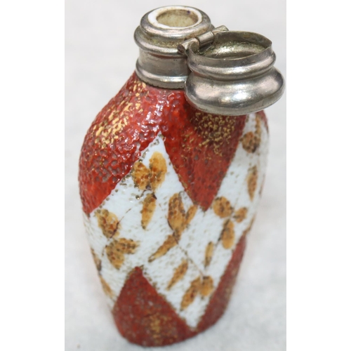 325 - A china and silver topped scent bottle with hinged lid on white and red ground with leaf decoration,... 