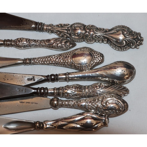 337 - 7 various silver handled shoe horns