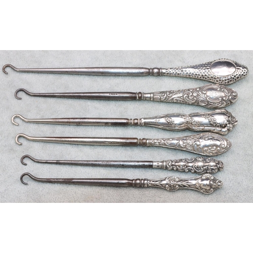 338 - 6 various silver handled button hooks