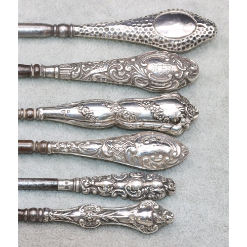 338 - 6 various silver handled button hooks