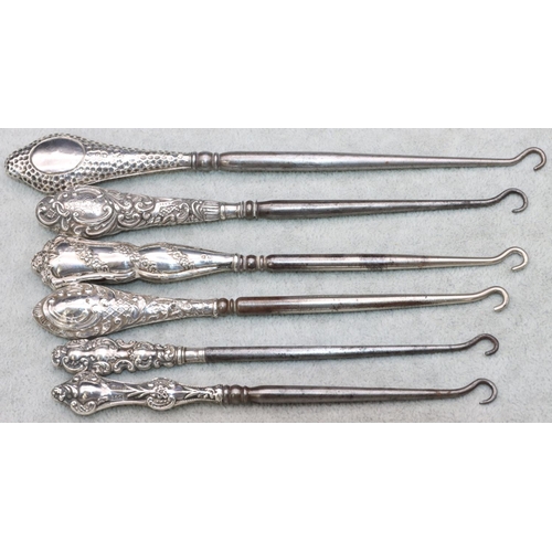 338 - 6 various silver handled button hooks