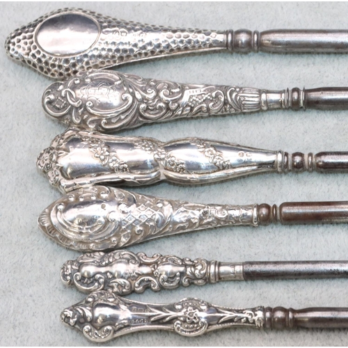 338 - 6 various silver handled button hooks