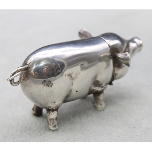 340 - A London silver novelty vesta case in the form of a pig with hinged head, 6.5cm long, 0.73oz