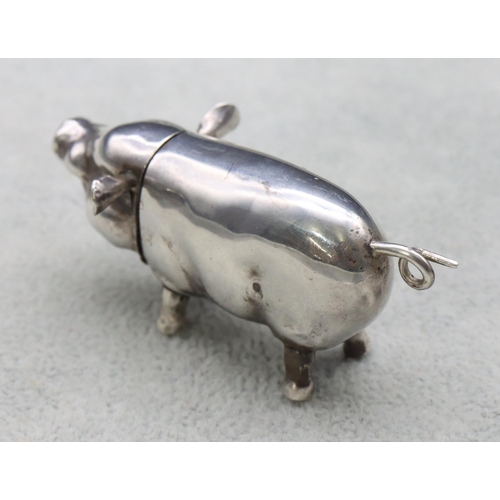 340 - A London silver novelty vesta case in the form of a pig with hinged head, 6.5cm long, 0.73oz