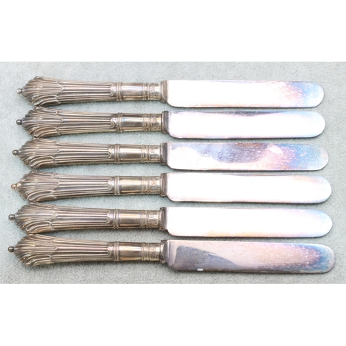 351 - A set of 6 silver handled butter knives with reeded decoration, in fitted black leather case