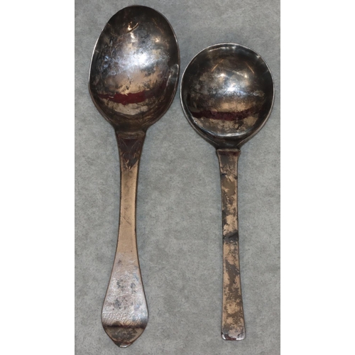 371 - An antique Danish silver marriage spoon with chased decoration and a similar silver coloured metal s... 