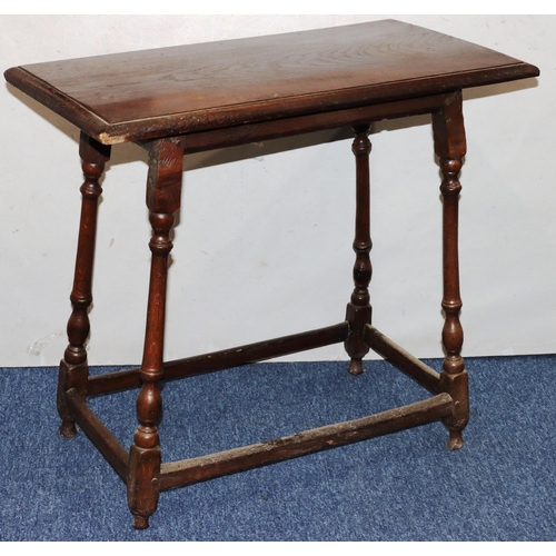 735 - An 18th Century oak rectangular shaped occasional table on turned legs with stretchers (top altered)... 