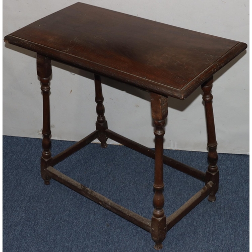 735 - An 18th Century oak rectangular shaped occasional table on turned legs with stretchers (top altered)... 