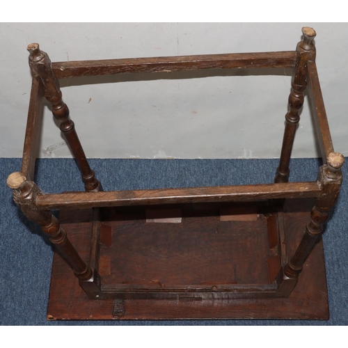 735 - An 18th Century oak rectangular shaped occasional table on turned legs with stretchers (top altered)... 