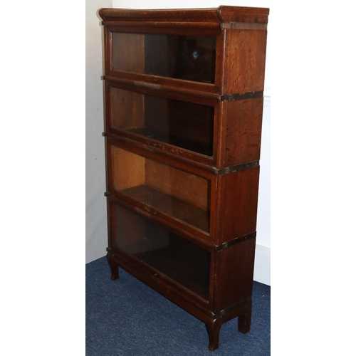 738 - A Globe Wernicke 4-sectioned oak graduated bookcase, 87cm wide, 26cm deep, 148cm high