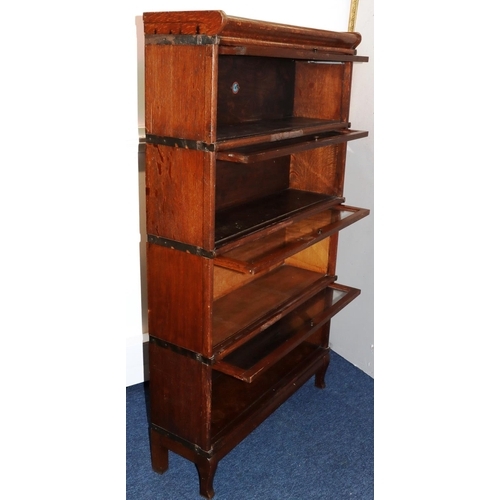 738 - A Globe Wernicke 4-sectioned oak graduated bookcase, 87cm wide, 26cm deep, 148cm high