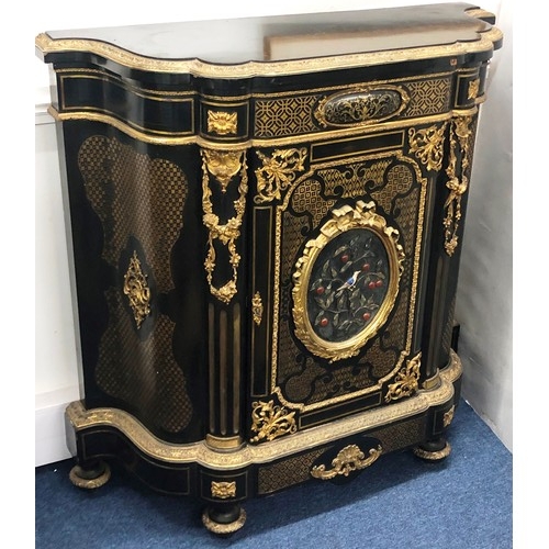 742 - A 19th Century ebonised and Ormolu Serpentine fronted side cabinet with allover raised floral, swag,... 