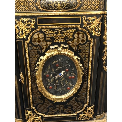 742 - A 19th Century ebonised and Ormolu Serpentine fronted side cabinet with allover raised floral, swag,... 