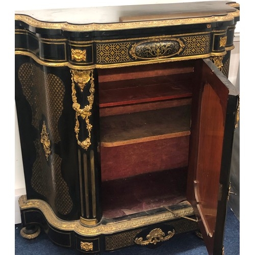 742 - A 19th Century ebonised and Ormolu Serpentine fronted side cabinet with allover raised floral, swag,... 