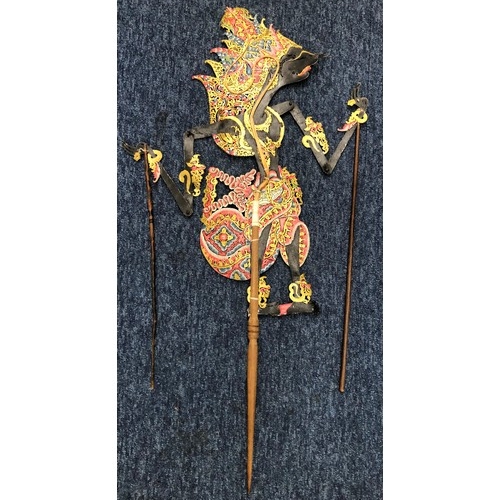 2357 - A Indonesian shadow puppet, 74.5cm high from base of handle to top of head, working condition