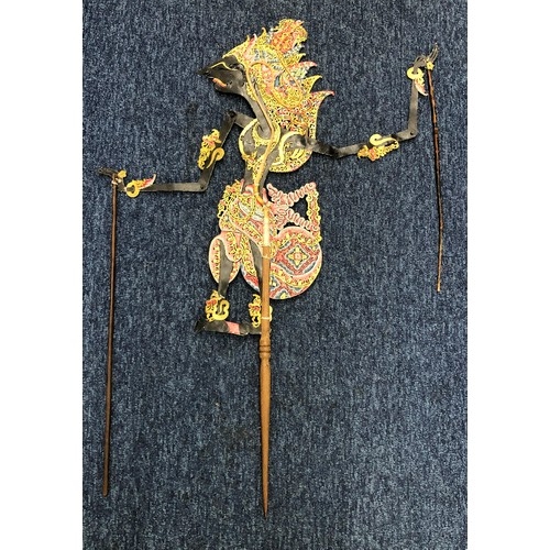 2357 - A Indonesian shadow puppet, 74.5cm high from base of handle to top of head, working condition