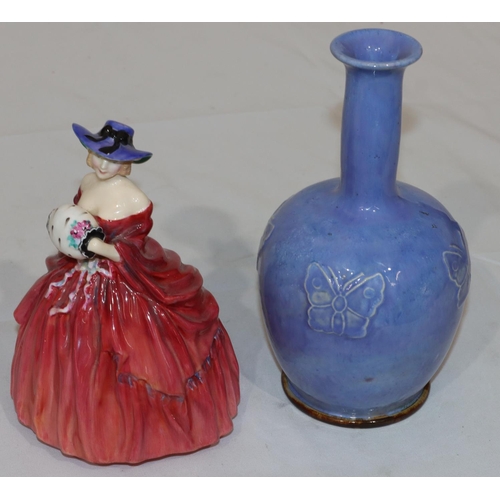 173 - A Royal Doulton glazed earthenware round bulbous thin necked bottle inscribed 