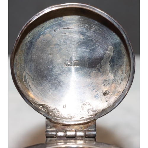 257 - A Birmingham silver round inkstand with hinged lid with engraved presentation, enclosing glass liner... 