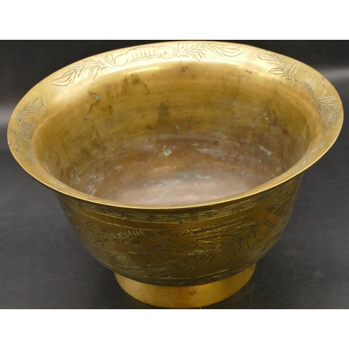 671 - A 19th Century Chinese gilt metal round trumpet shaped bowl with allover carved dragon, floral and k... 