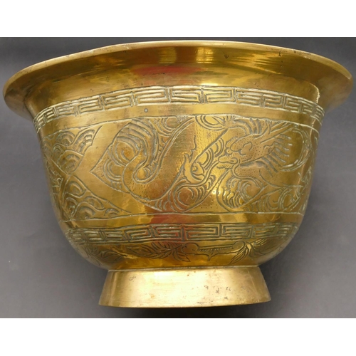 671 - A 19th Century Chinese gilt metal round trumpet shaped bowl with allover carved dragon, floral and k... 