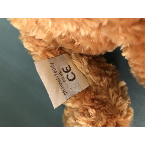 2203 - A teddy bear, 49cm long, 2 Andrex soft toy puppies, a Teddy with Channel-teddy label, a soft toy rei... 