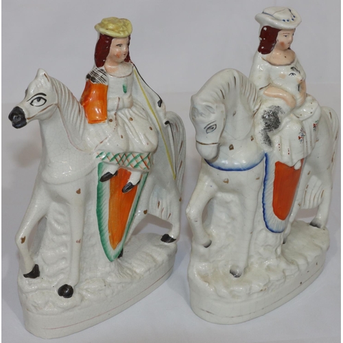 85 - 2 19th Century Staffordshire groups of young girls seated on horses, 27cm high (crackle wear to back... 