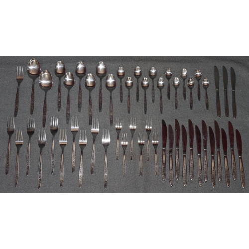 285 - A Memogram stainless steel 6-place setting flatware service (1 fork missing)