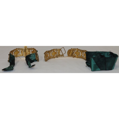 498 - A gilt metal Continental sectioned belt clip mounted with green stones, embossed floral and scroll d... 