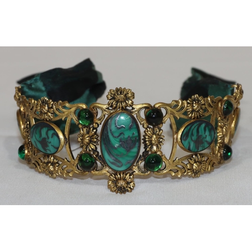 498 - A gilt metal Continental sectioned belt clip mounted with green stones, embossed floral and scroll d... 