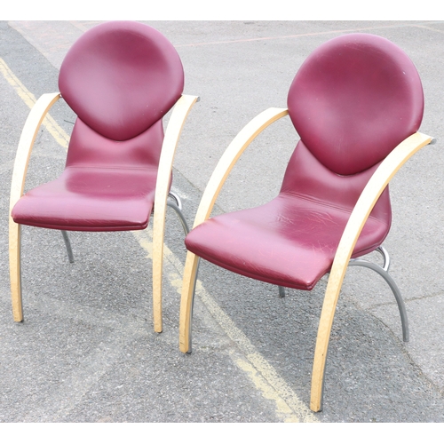 926 - A pair of Art Deco style red leather armchairs with chrome and maple wood style decoration, 64cm wid... 