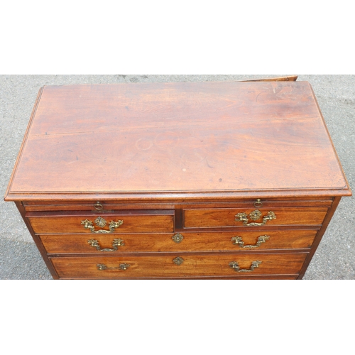 927 - A George III mahogany straight front chest of drawers with brush slide above 2 short and 3 long grad... 