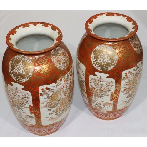 10 - A pair of Meiji period Kutani round bulbous thin necked trumpet shaped vases on white and red ground... 