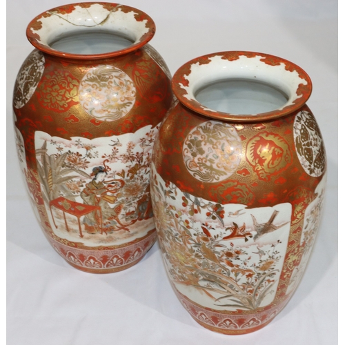 10 - A pair of Meiji period Kutani round bulbous thin necked trumpet shaped vases on white and red ground... 