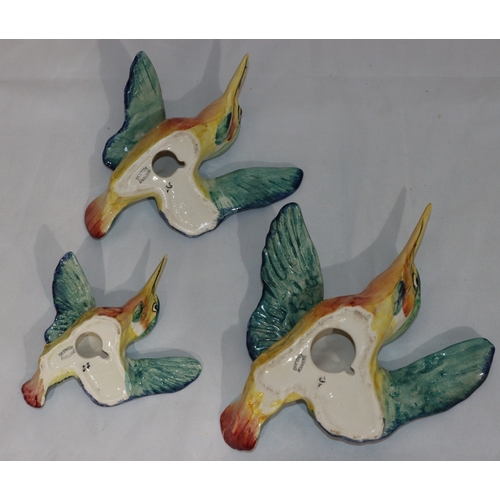 102 - A set of 3 Beswick wall plaques in the form of Kingfishers, largest 20cm wide (3)