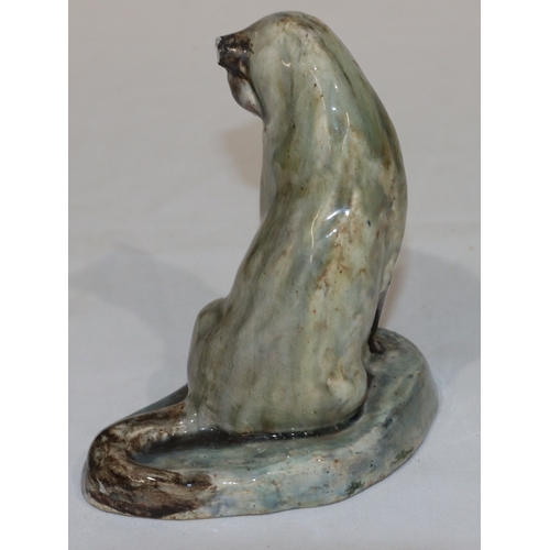 104 - Stella Rebecca Crofts (1898-1964) glazed model of a seated cat, 14.5cm high (1 ear a/f)