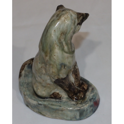 104 - Stella Rebecca Crofts (1898-1964) glazed model of a seated cat, 14.5cm high (1 ear a/f)